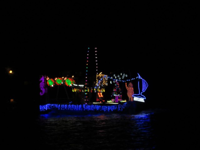 The Palm Beach holiday Bat Parade was last Saturday. It was north of our anchorage, but we did get to see this one boat go by on its way.