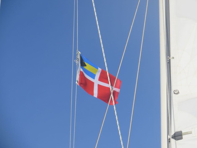 A Bahama courtesy flag flying in the breeze