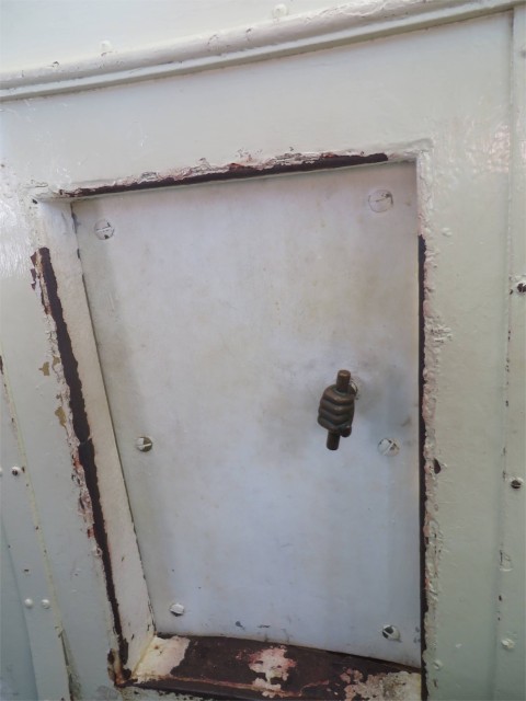 This funny little door is the entrance to the outside balcony. Notice the whimsical handle?