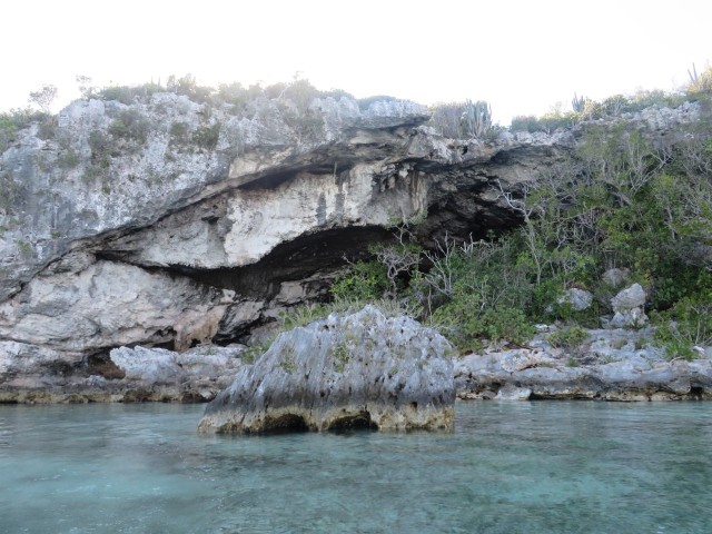 One of the caves align the harbor's edge