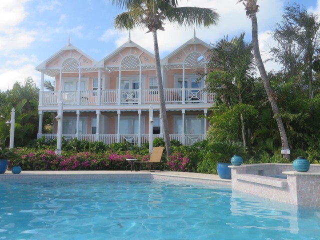 The rooms at the Hope Town Inn and Marina overlook their pool.