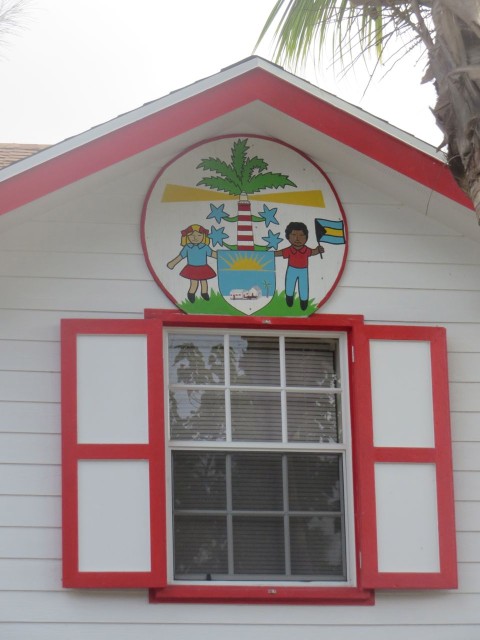 HT Primary School emblem