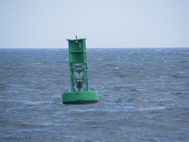 As we approached the Sandy Hook peninsula, ready to make the turn, my ears heard a different sound from this ordinary looking green marker buoy. Instead of a simple clanging bell, it sounded like church bells. There were three distinctly different chiming sounds. 