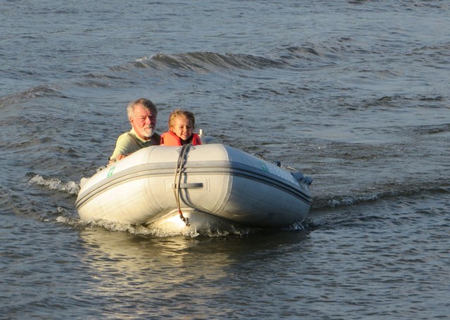 The boys go for a dinghy ride.