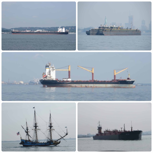 Barges, tankers, tugs, and a curious sailing vessel.