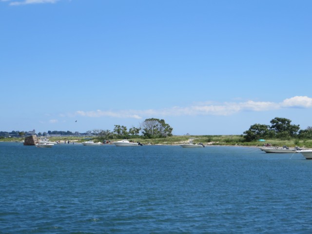 After rounding the point the channel passes the beaches where small boats anchor for a day trip.