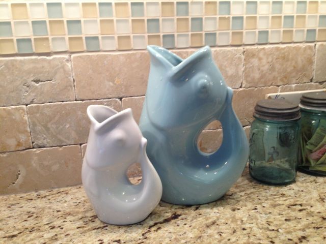 I have had the little white GurglePot for years and could not resist adding the larger blue one as a companion. I love the sound that water makes when it is poured from these pitchers.