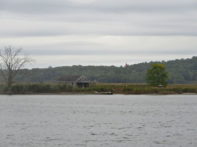 We spotted this little house right on the water, in every sense of "right on the water." It's been there for years - good to see it it has not been swept away in any floods or storms.