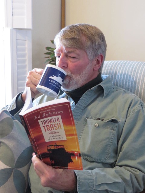 Al's kind of reading - "Trawler Trash, Confessions of a Boat Bum". Notice his new coffee mug? It says "I SIP DIESEL" 