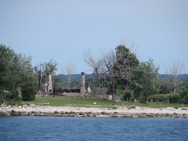 Chimneys remaining after the fires. We could see this as we passed by the island on earlier trips.