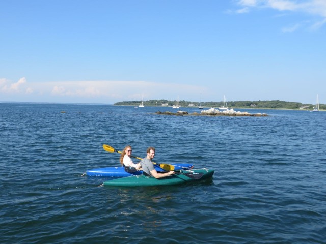 Mom and dad get to go kayaking around West Harbor.