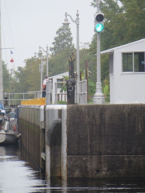 We have the green light so we enter the lock after the sailboat. Notice how low the water is.