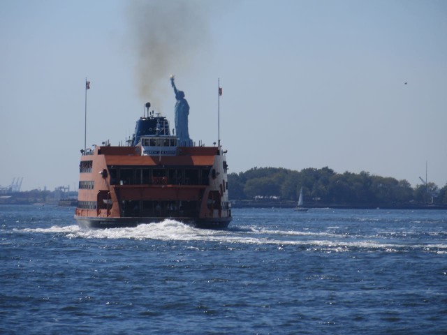 Couldn't resist this - Is that Lady Liberty hitching a ride on the orange Staten island Ferry?? 