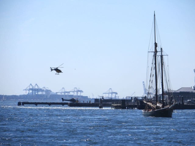 A little incongruous to see the helicopter and the old sailing vessel together.