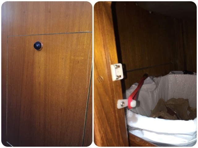 The trash can "doohickey" for rough seas. Insert the red cord through the hold so that the black knob gets caught in the lid's hole.Then hook the cord around the white hook that he installed don the inside of the cabinet door below the sink. Got that?