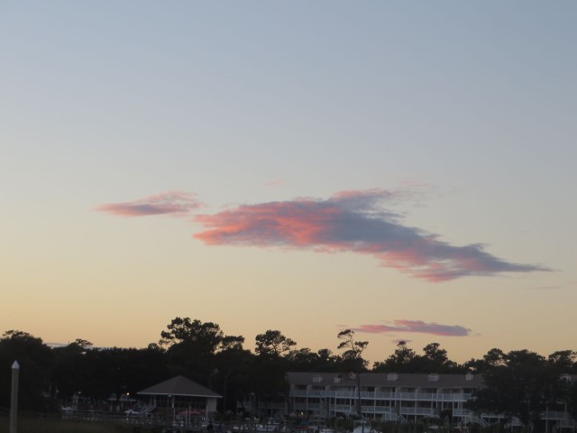 Playful clouds in the sunset - a fish chasing a small bait fish. Do you see it, too?