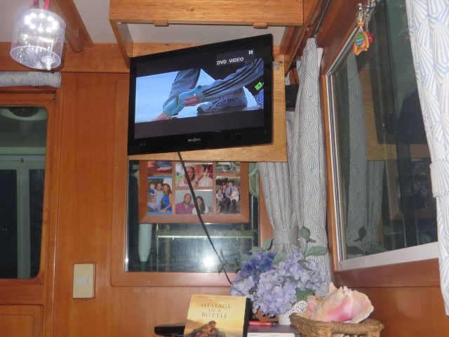 Movie night on Kindred Spirit. Using our drop-down tv. See the message in the bottle that she picked up? 