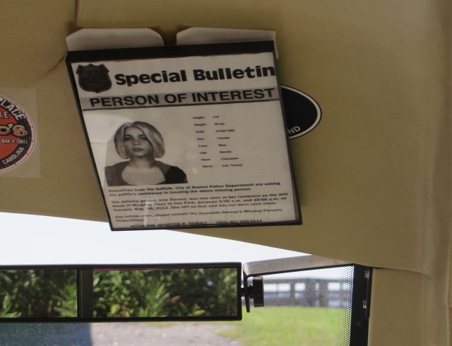 Rev has this "Wanted"poster hanging on the visor of his golf cart. It's not real - it's the one from the Safe Haven movie for Julianne Hough's character, Katie/Erin. 