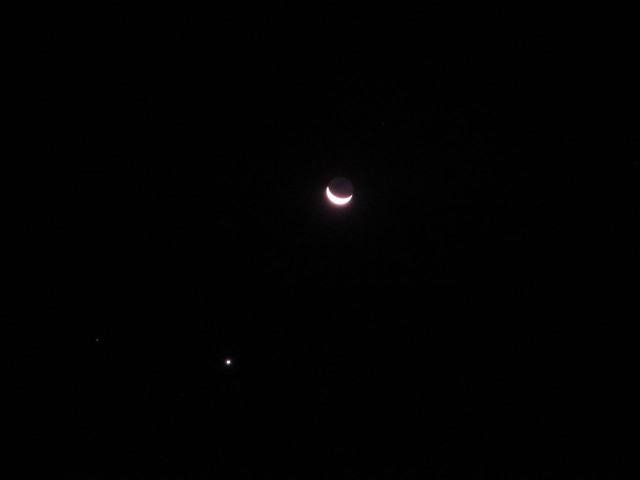 As I prepared our coffee and breakfast around 5:45 am, the "waning crescent moon" was visible in the dark early morning sky.