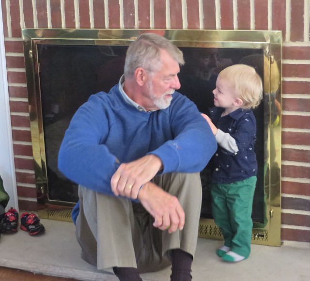 Papa Al and Caleb (our New York grandson) have a chat by the fireplace.