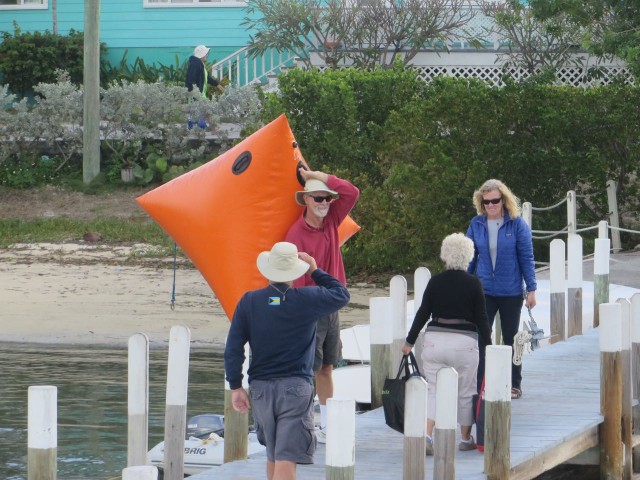 Al is carrying the orange inflatable tetrahedron "mark" out to Kindred Spirit.