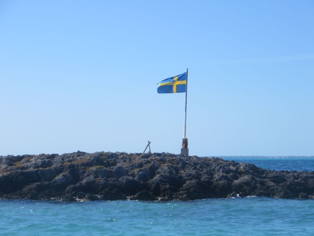 Sure looks like the Swedish flag to me. Perhaps Magnus and Charlotte on Swede Dreams staked a claim?