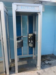 BATELCO phone booth! I wish now that I had picked up the phone to listen for a dial tone. I will bet it is not a working phone booth.