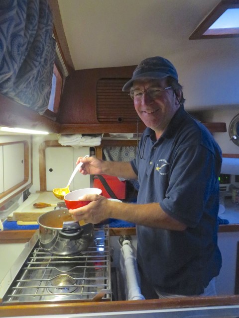 The chef at work in his galley, serving up the A2B chili special.