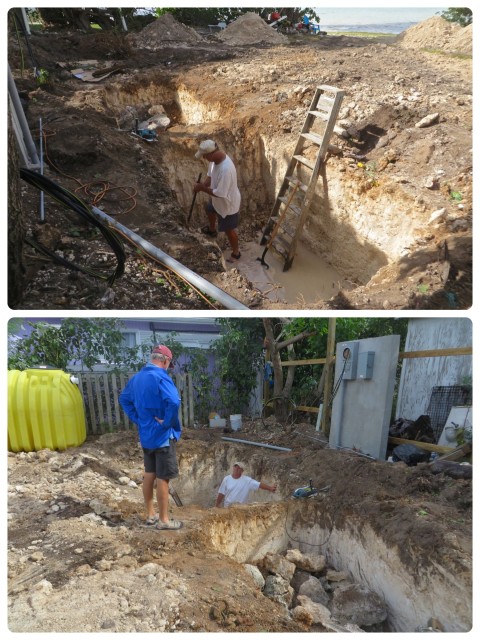 Al chatting with John (in septic tank hole). The digger dug the two holes for the septic tank,