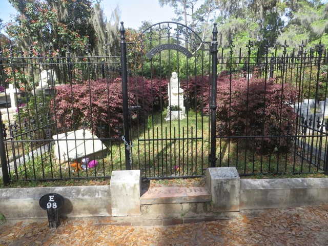 Like the “Bird Girl” statue, little Gracie Watson has become very popular, and the grave is now fenced off in wrought-iron to prevent further damage. If you look closely you can see stuffed animal toys that people leave for her.