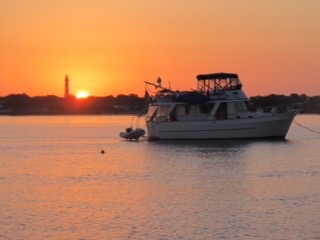 Kindred Spirit, moored in St. Augustine with the lighthouse in the background.