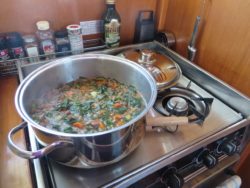 Calm enough to cook a pot of sausage lentil soup while underway. Simmering soup helped to warm the cabin and then our tummies.