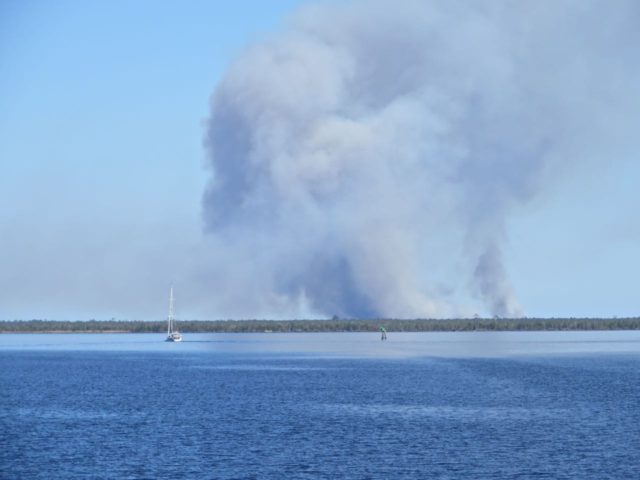 We watched this smoke billowing up for quite a distance as we came through he Alligator River . Never did find out the cause.