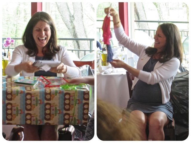 Steph, our happy, glowing mother-to-be, enjoying her special day and gifts for the "little nugget" as we call her.